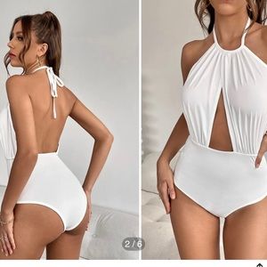 BRAND NEW Shein body suit. White.  Large. Ordered wrong sizes never been worn.